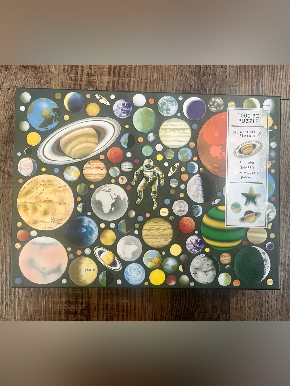 Galison space puzzle with shaped pieces-sealed